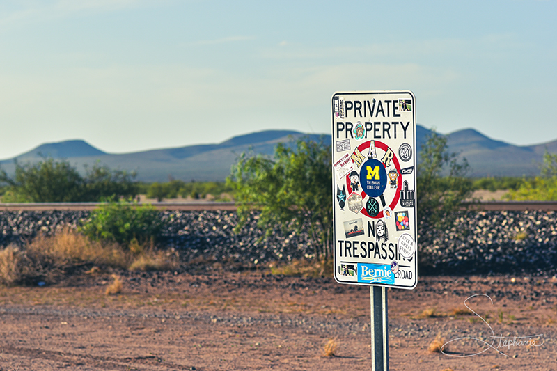 Vandalized street sign in Marfa, Texas.