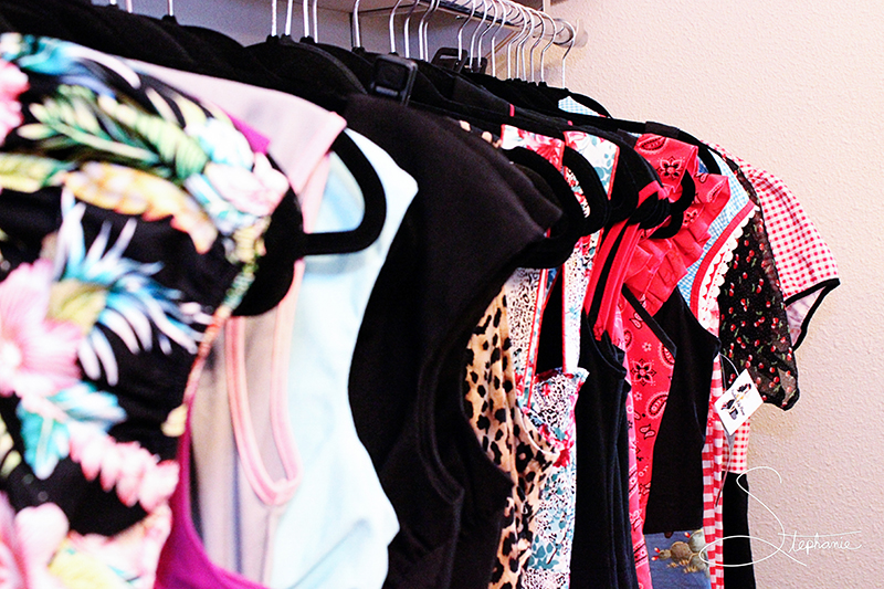 A photo of clothing on a rack.