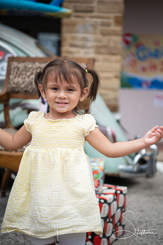 A small child playing outside.