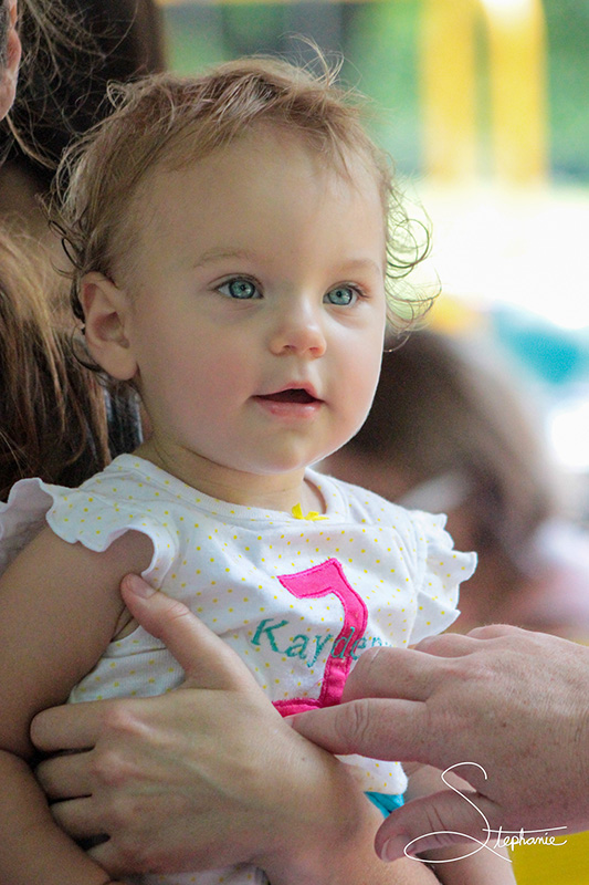 A small child at her birthday.