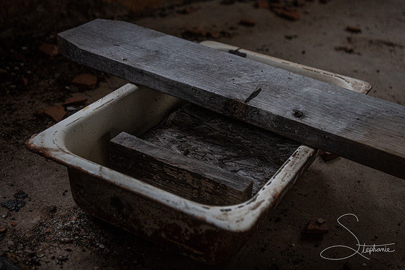 An old sink in an abandoned house.